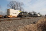 NS 7582 leads a westbound stack train